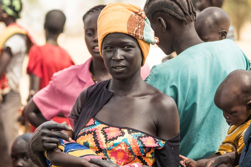 Eine Frau mit Kind in Uganda Eine Frau mit Kind in Uganda