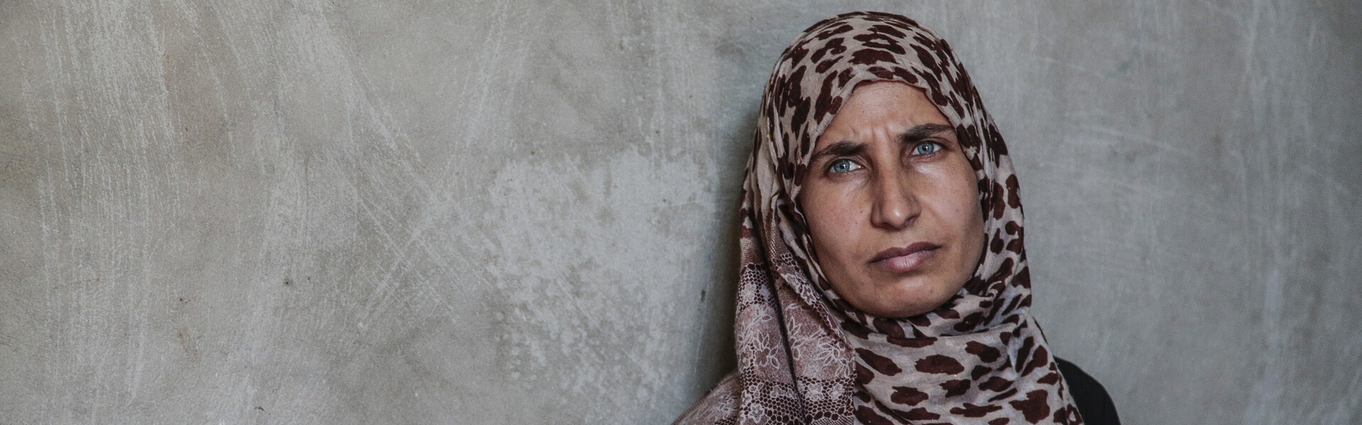 Diese Frau gehört zu den zahlreichen Menschen, die aus Syrien geflohen sind.