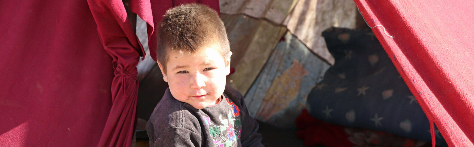 Ein Kind in einem Camp für Vertriebene in Afghanistan