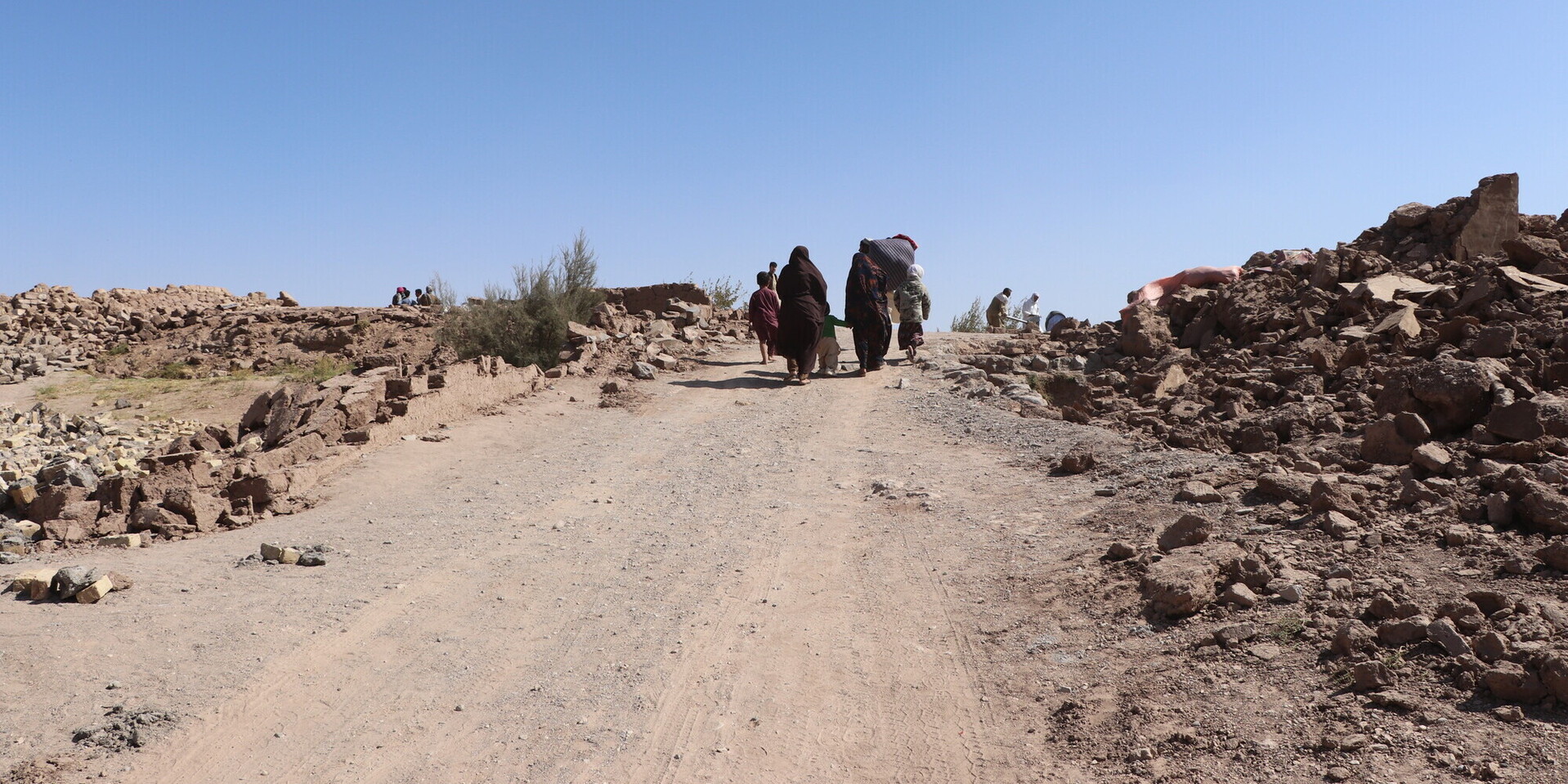 Menschen in Afghanistan, wo der Klimawandel auf die bestehende politische Krise trifft Menschen in Afghanistan, wo der Klimawandel auf die bestehende politische Krise trifft