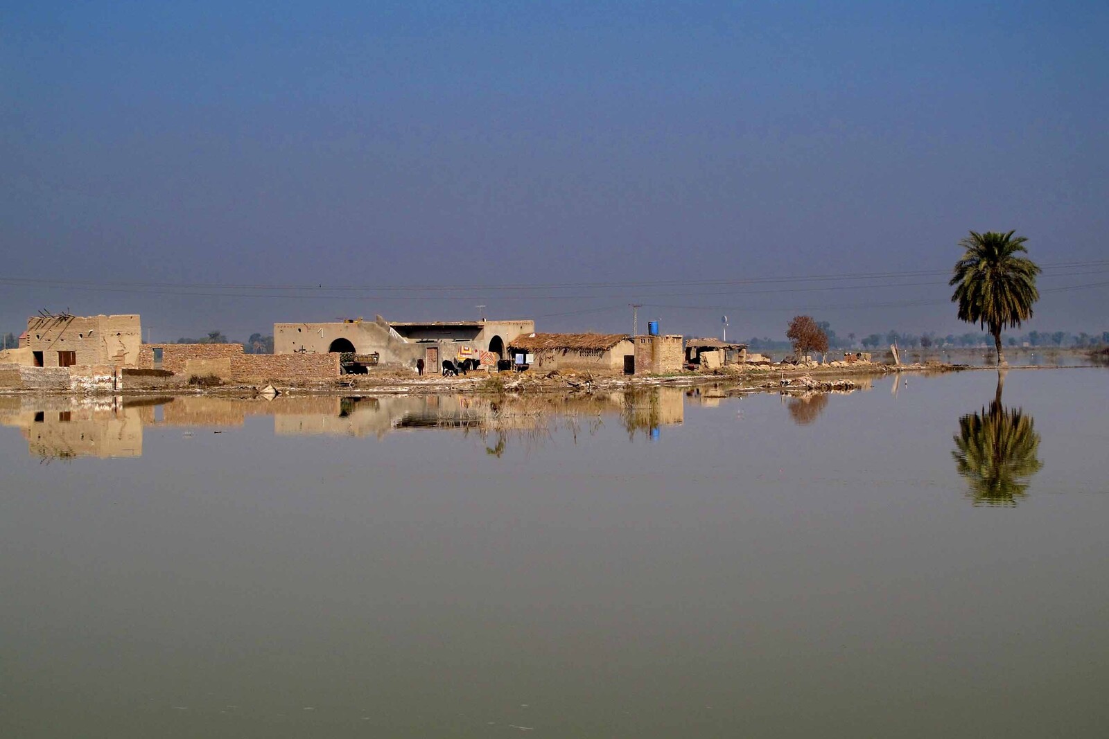 Flut Pakistan Überschwemmung Häuser Wasser