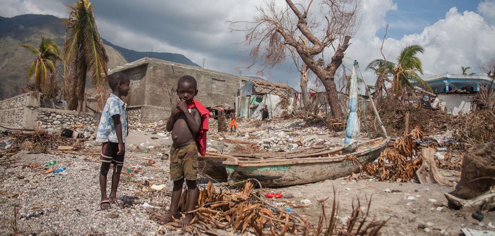 Kinder inmitten zerstörter Häuser: 2016 hinterließ Hurrikan Matthew ein Feld der Verwüstung auf Haiti - Archivbild Kinder inmitten zerstörter Häuser: 2016 hinterließ Hurrikan Matthew ein Feld der Verwüstung auf Haiti - Archivbild