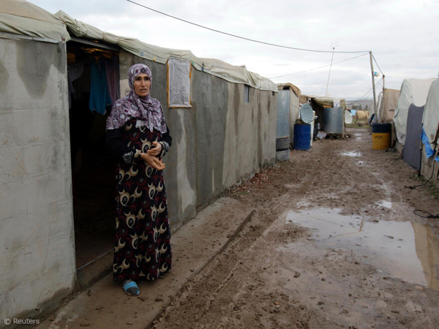 003-800-jahresrueckblick-2012 Frau im Flüchtlingslager im Irak