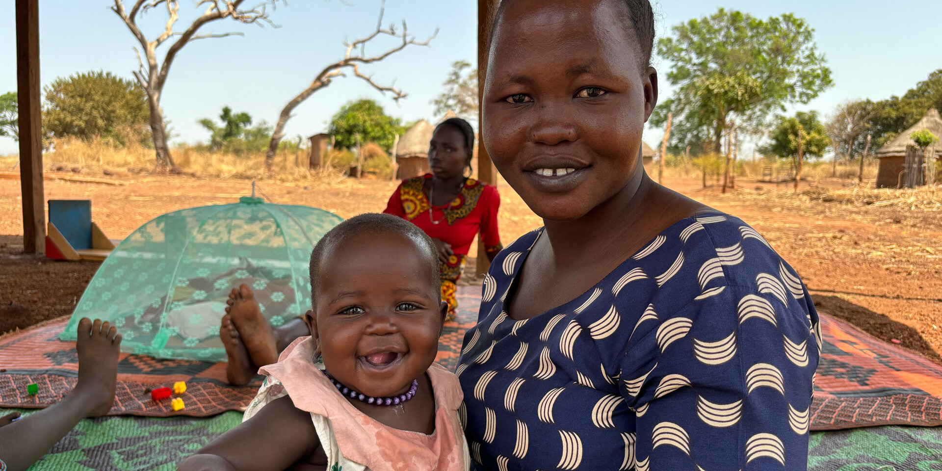 Eine Frau mit ihrem Kind im Südsudan Eine Frau mit ihrem Kind im Südsudan