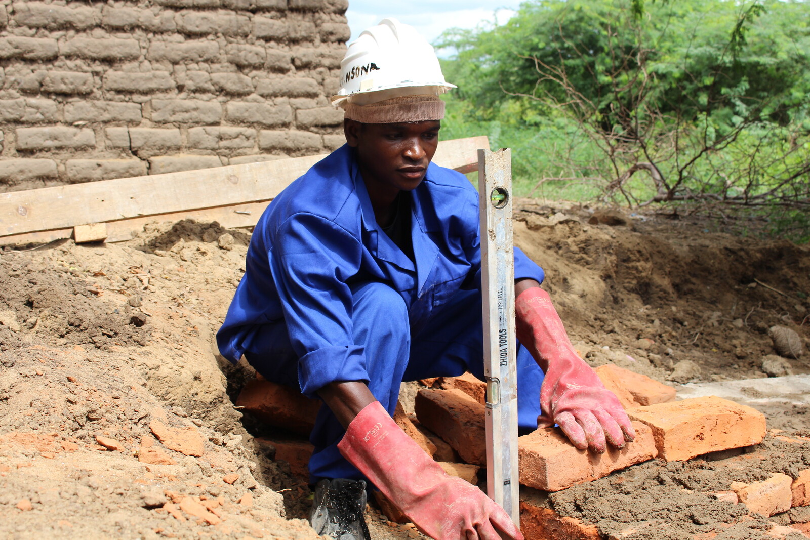 Bauarbeiten eines neuen Hauses in Malawi