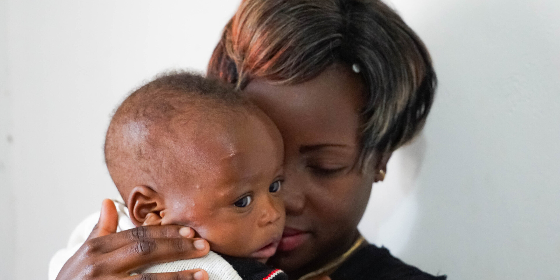 Malaika aus der DR Kongo mit ihrem kleinen Sohn Malaika aus der DR Kongo mit ihrem kleinen Sohn
