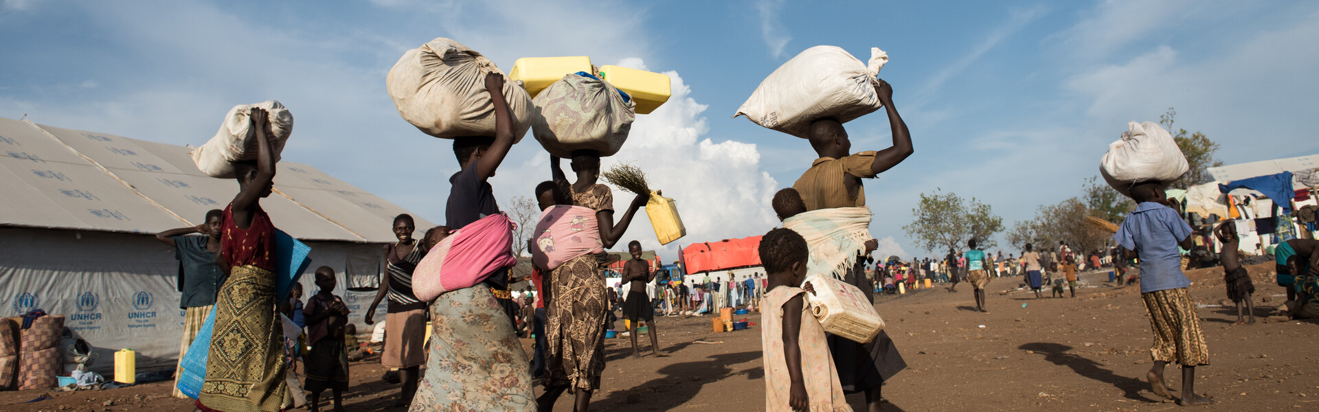Menschen aus dem Südsudan in Uganda – neben dem Klimawandel gibt es viele Gründe für Flucht und Migration