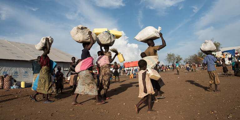 Menschen aus dem Südsudan in Uganda – neben dem Klimawandel gibt es viele Gründe für Flucht und Migration