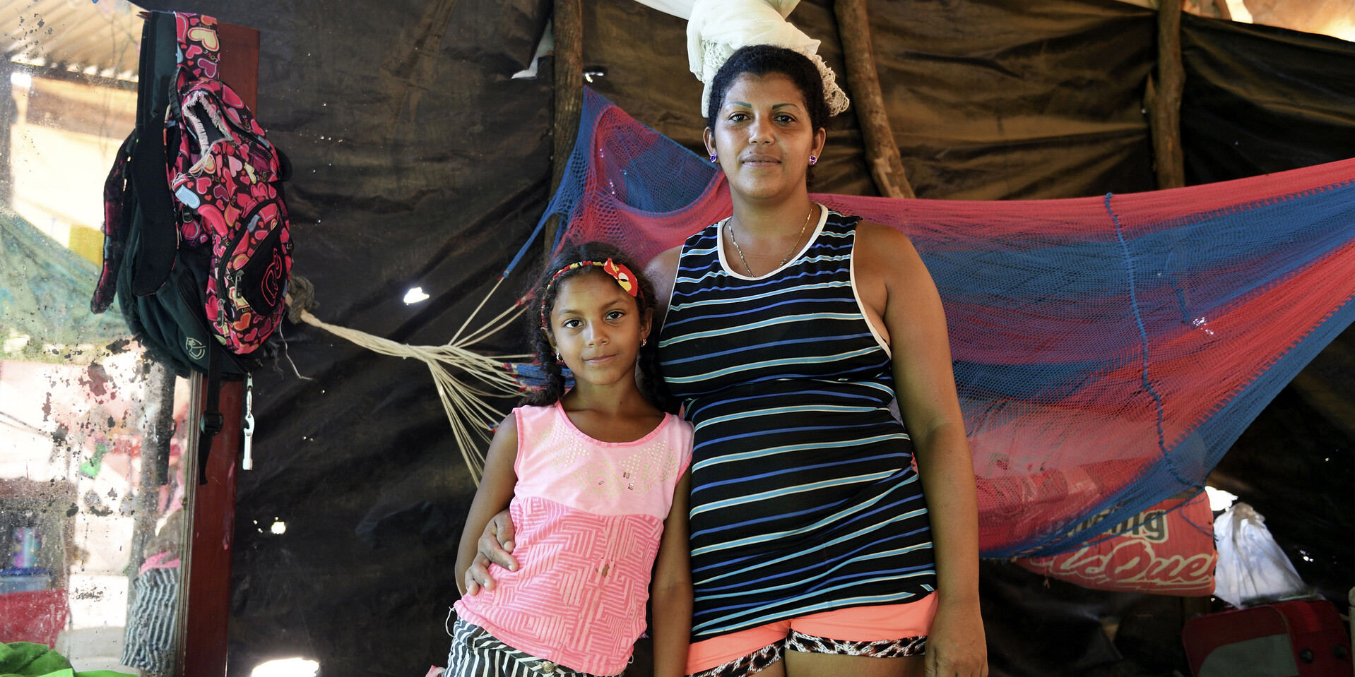 Eine Frau aus Venezuela hat mit ihrer Tochter Zuflucht in Kolumbien gefunden Eine Frau aus Venezuela hat mit ihrer Tochter Zuflucht in Kolumbien gefunden
