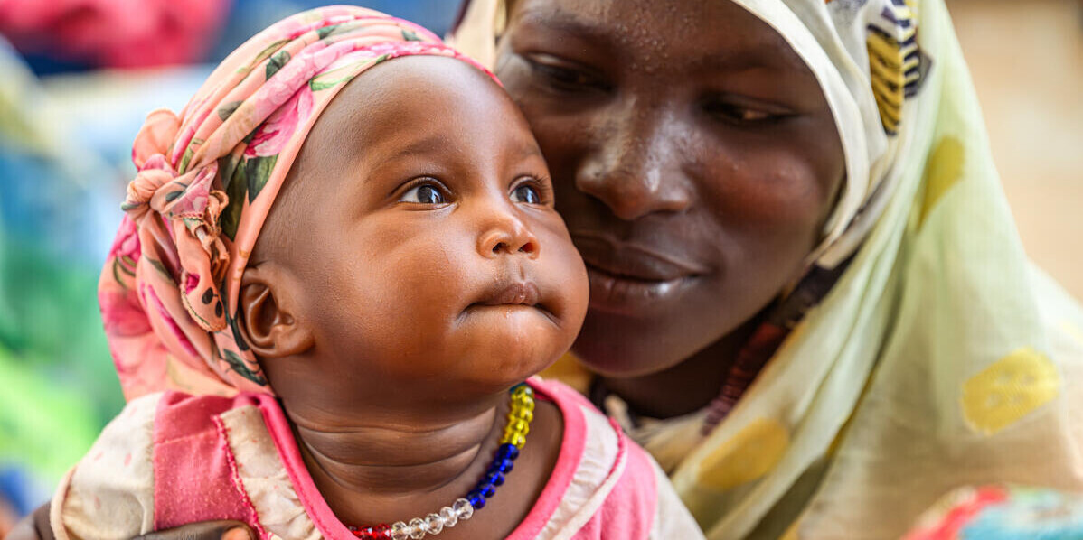 Frau mit Kind aus dem Sudan Frau mit Kind aus dem Sudan