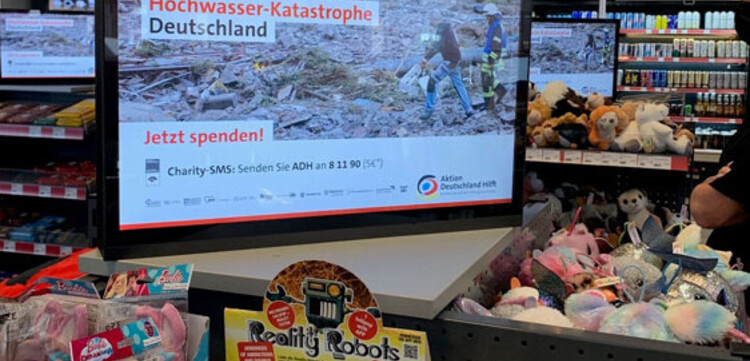 Cittadino sponsored Werbescreens an Raststätten für Aktion Deutschland Hilft