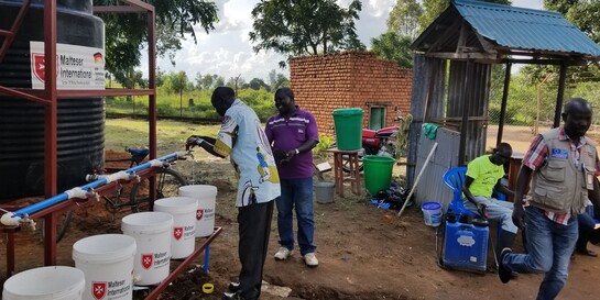 Menschen in einem Hilfsprojekt von Malteser International in der DR Kongo