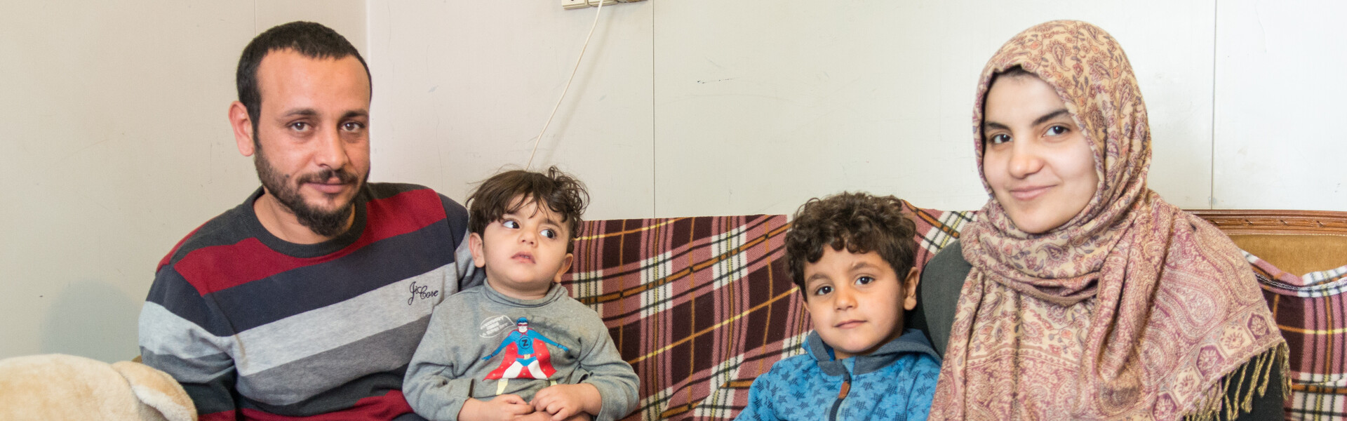 Eien Familie aus dem Irak in einem Flüchtlingscamp in Griechenland