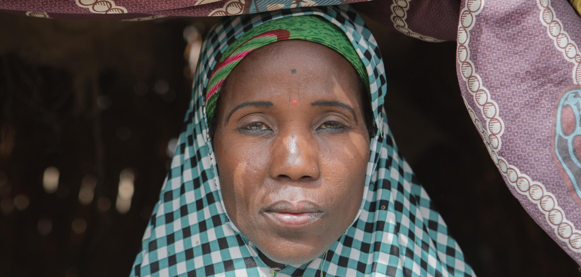 Kulu und ihre Kinder gehören zu den zahlreichen Binnenvertriebenen in Nigeria. Kulu und ihre Kinder gehören zu den zahlreichen Binnenvertriebenen in Nigeria.