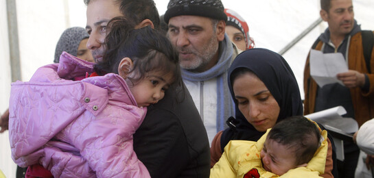 Familie auf der Flucht vor Krieg und Terror