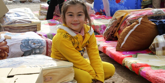 Ein Mädchen in einem Flüchtlingslager im Irak