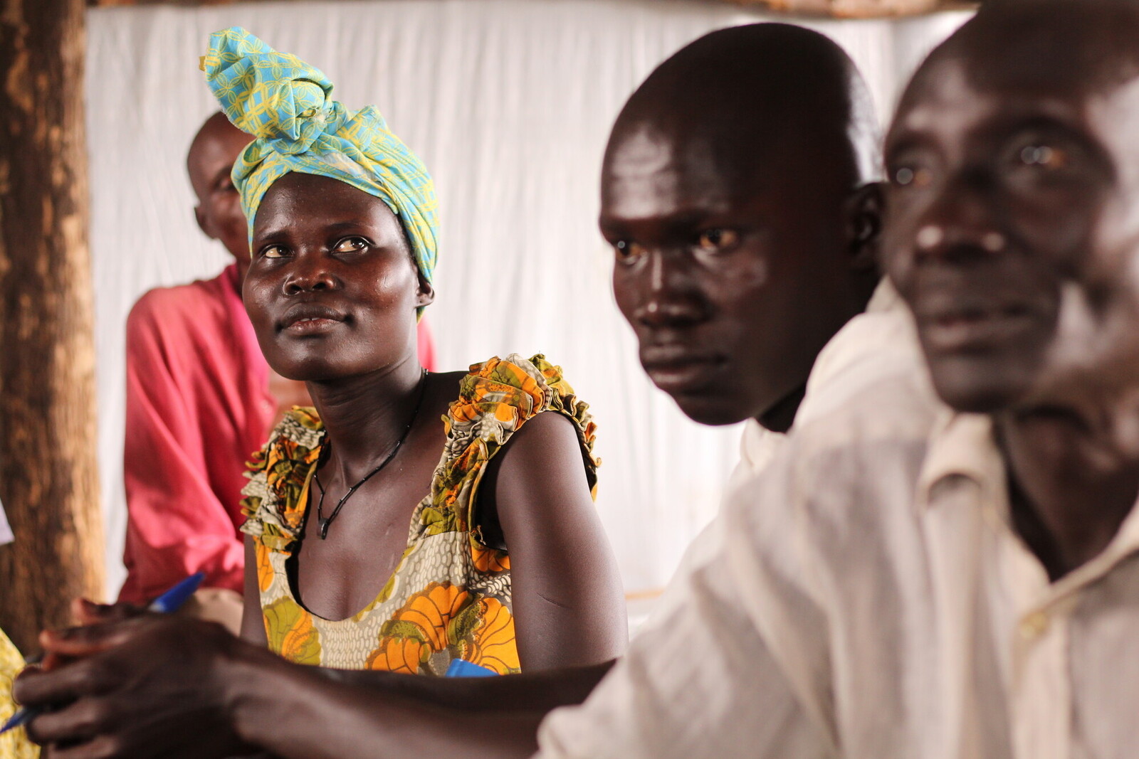 Frauen und Männer in Uganda, Afrika