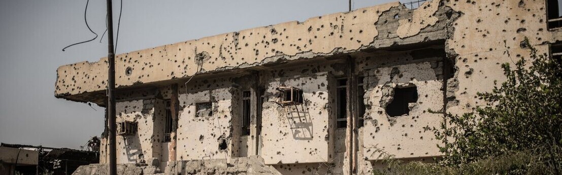 Ein von Kugeln zerstörtes Haus im Irak