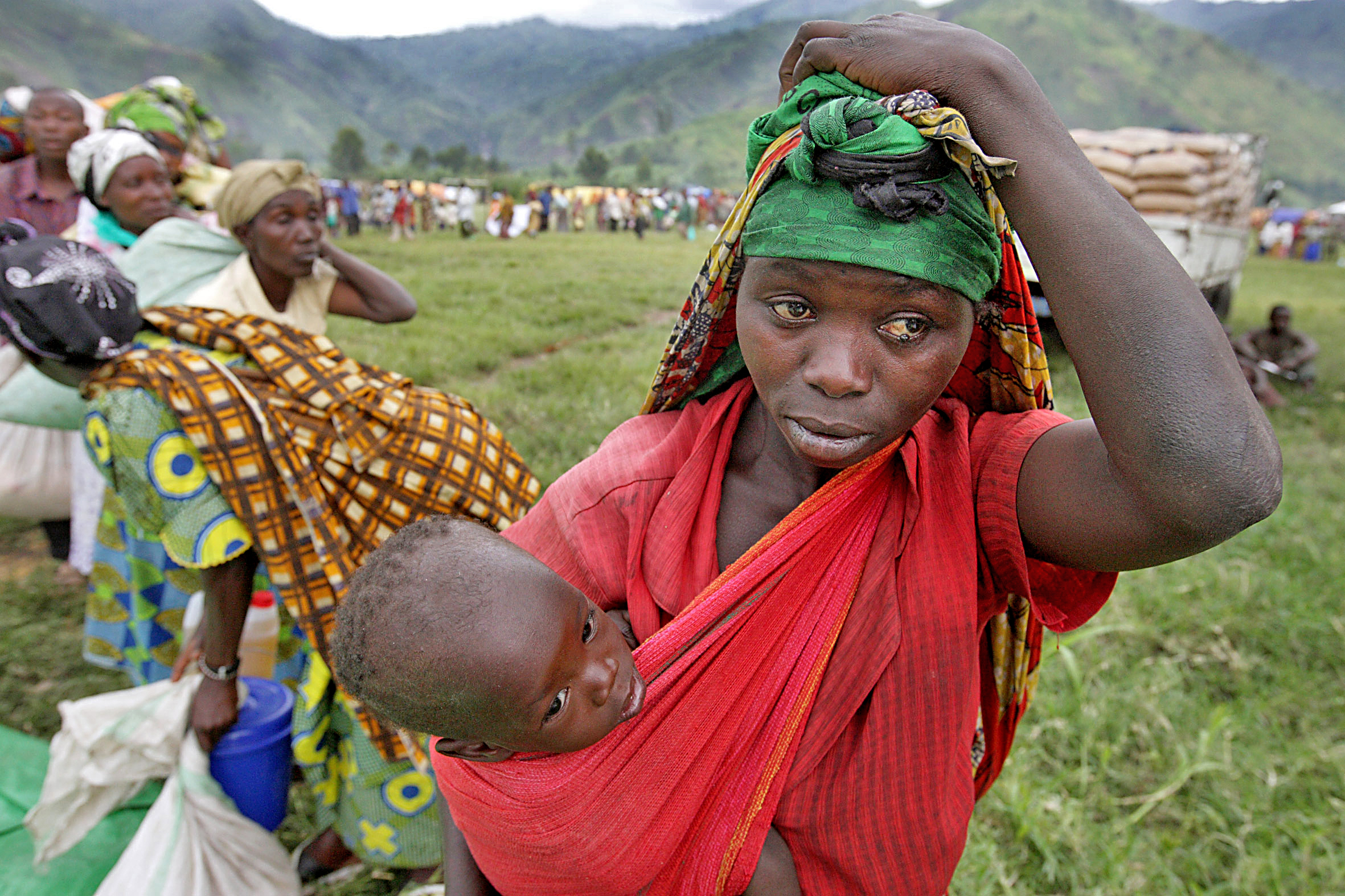 Frau mit Kind in der DR Kongo, wo Ebola um sich greift – jetzt spenden & helfen! (Archivbild)